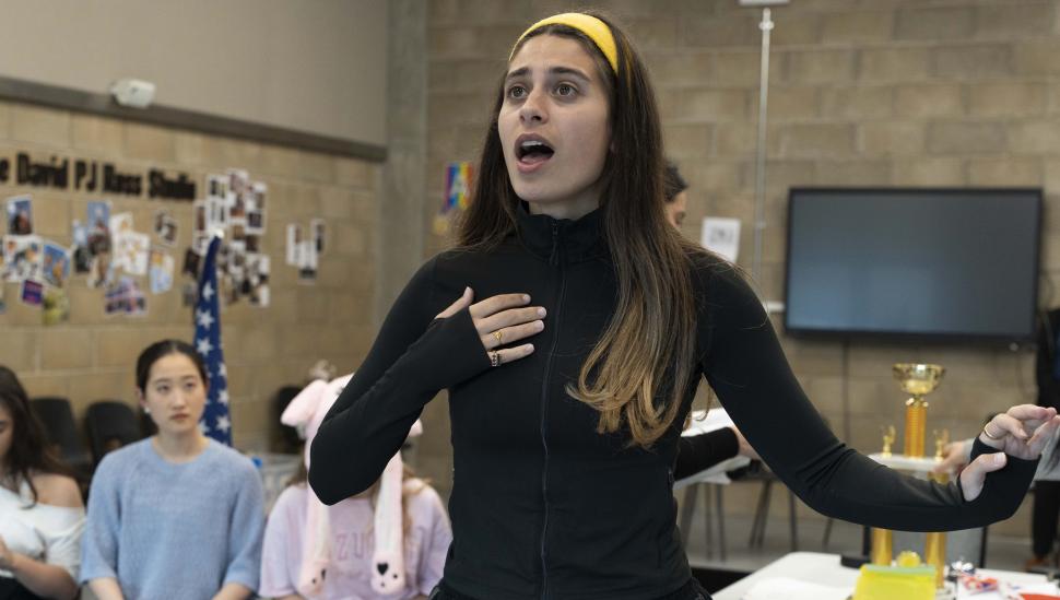 A LAMDA student singing in rehearsals