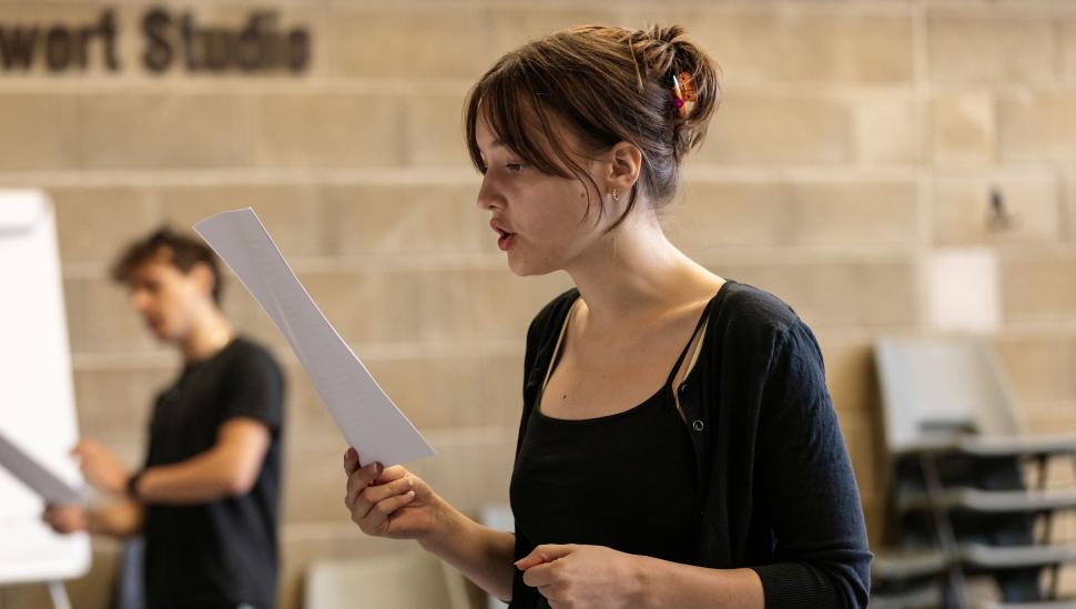 A LAMDA Shakespeare Summer School student holding a script